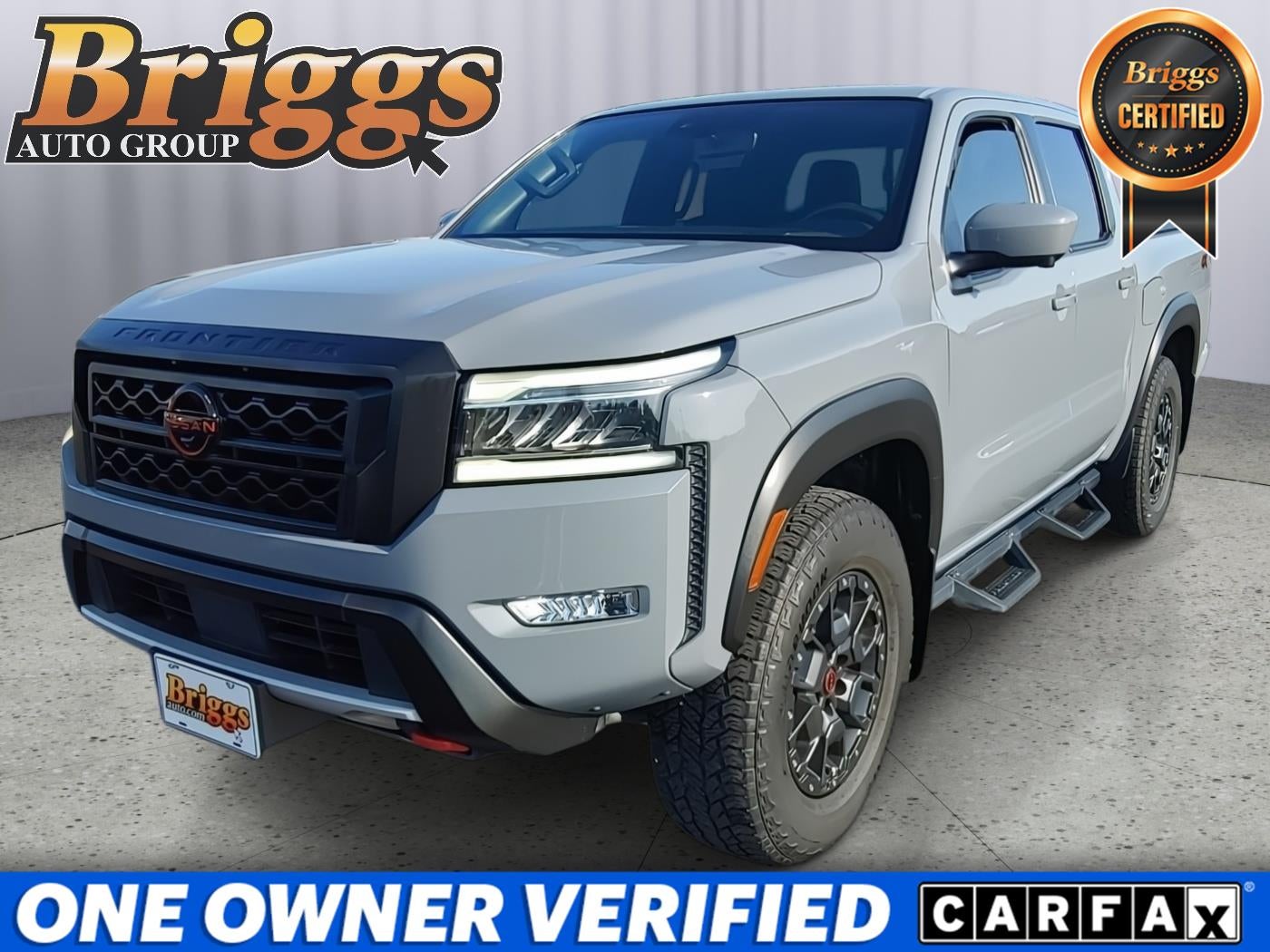 2023 Nissan Frontier PRO-4X in Boulder Gray Pearl — front three-quarter view