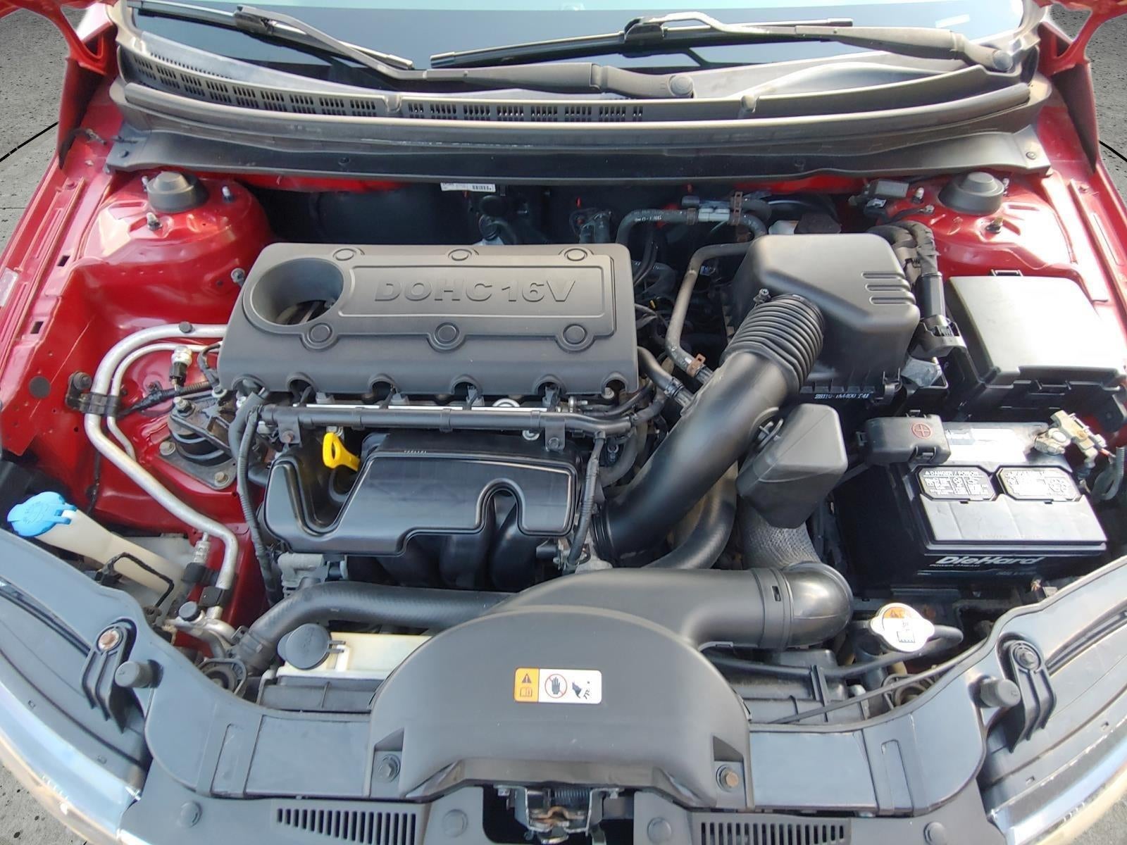 2013 Kia Forte — rear three-quarter view