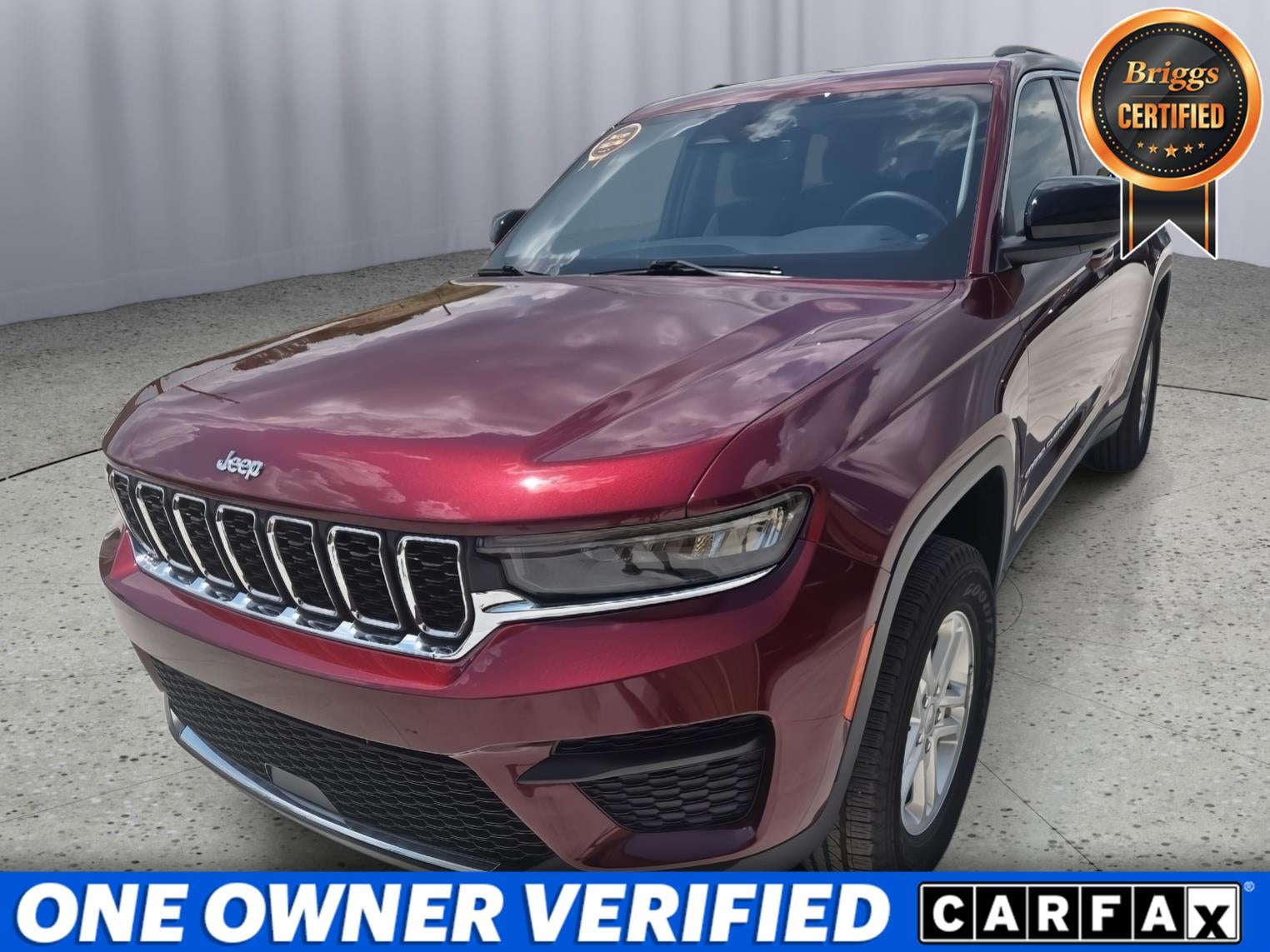 2023 Jeep Grand Cherokee Laredo in Velvet Red Pearlcoat — front three-quarter view