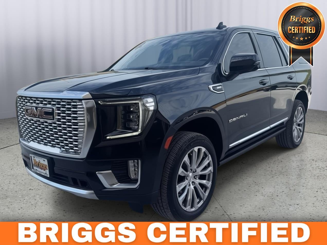 2022 GMC Yukon 4WD Denali in Midnight Blue Metallic — front three-quarter view