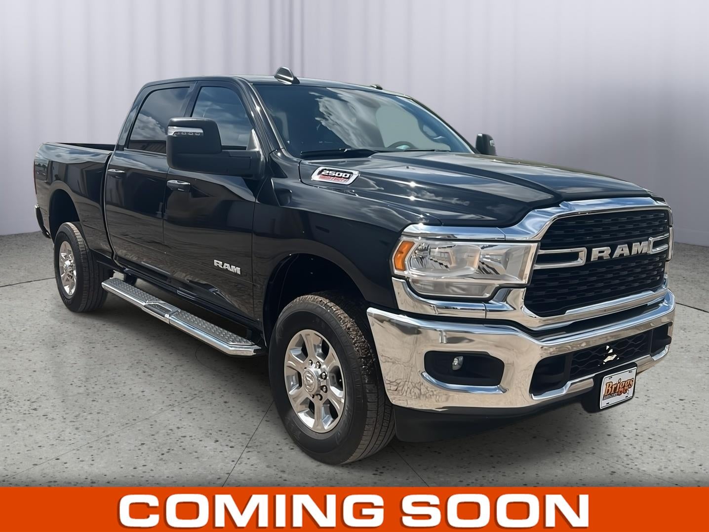 2024 RAM 2500 Big Horn Crew Cab 4x4 6'4' Box in Diamond Black Crystal Pearlcoat — front three-quarter view