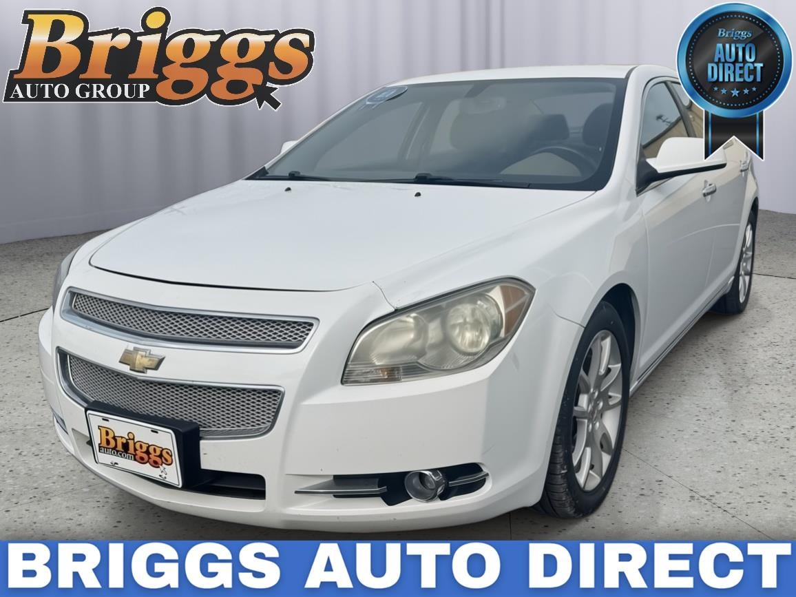 2010 Chevrolet Malibu LTZ in Summit White — front three-quarter view