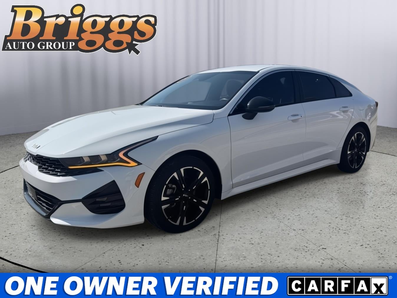 2024 Kia K5 GT-Line in Glacial White Pearl — front three-quarter view