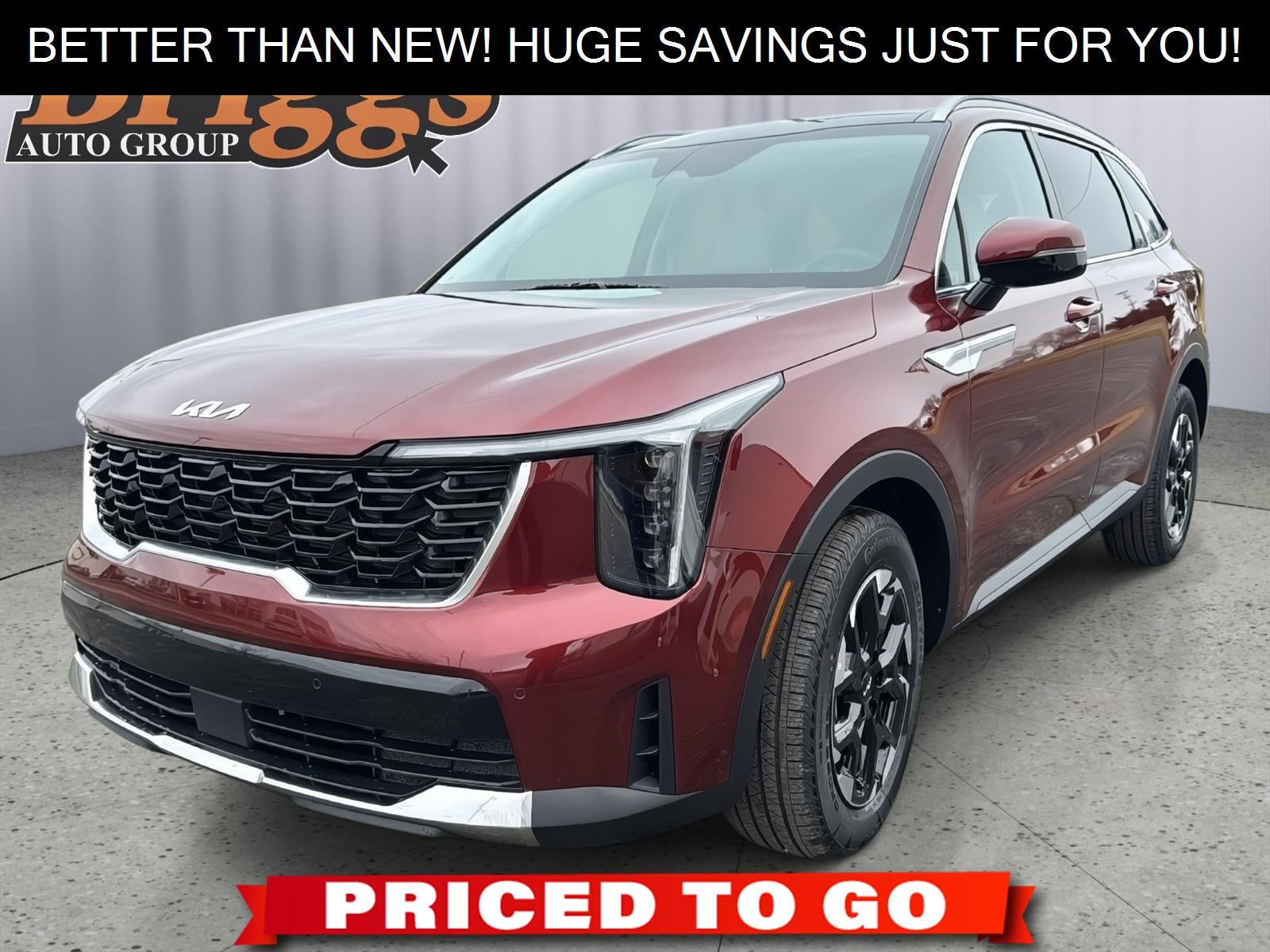 2025 Kia Sorento S in Dawning Red — front three-quarter view