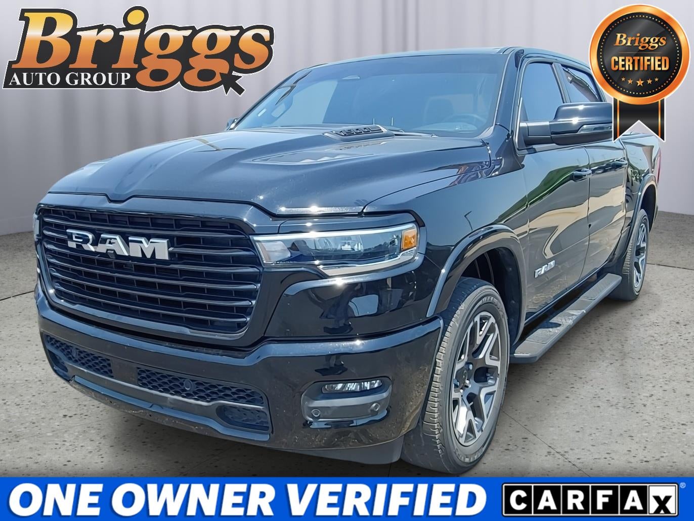 2025 RAM 1500 Laramie in Diamond Black Crystal Pearlcoat — front three-quarter view