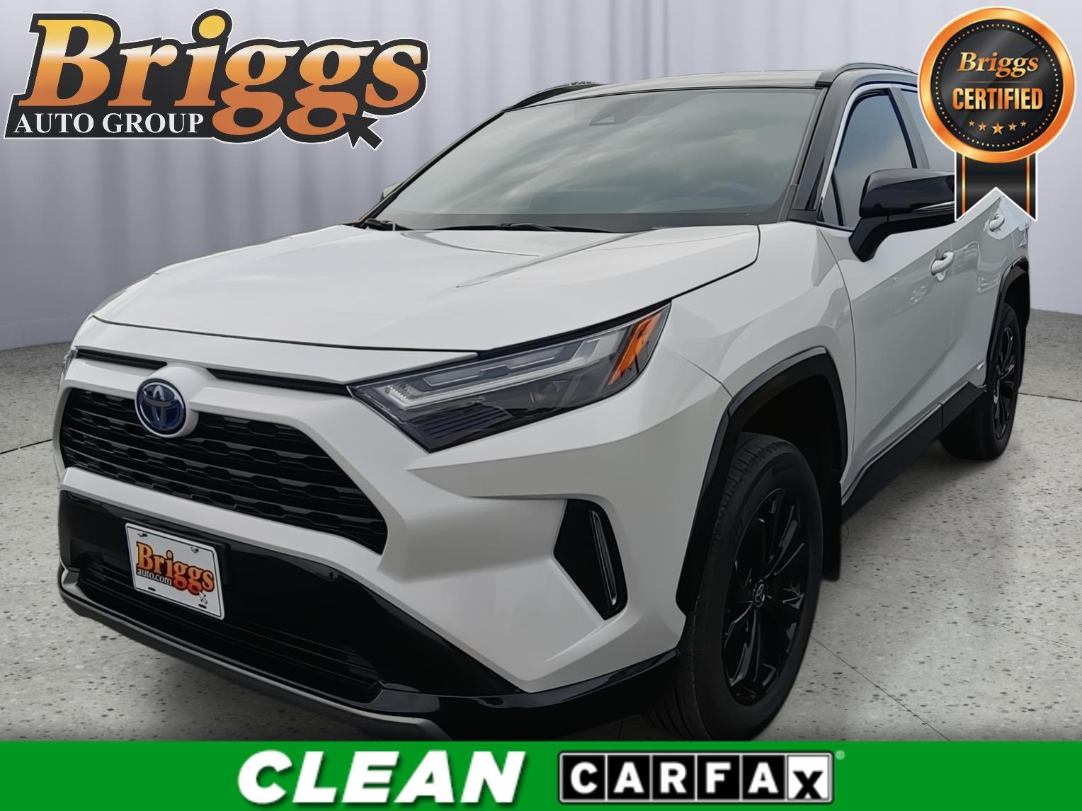 2024 Toyota RAV4 Hybrid XSE in Wind Chill Pearl And Midnight Black Metallic — front three-quarter view