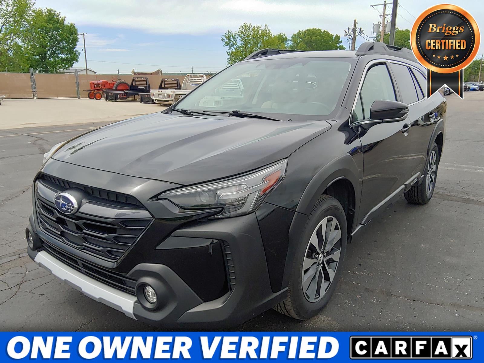 2024 Subaru Outback Limited in Crystal Black Silica — front three-quarter view