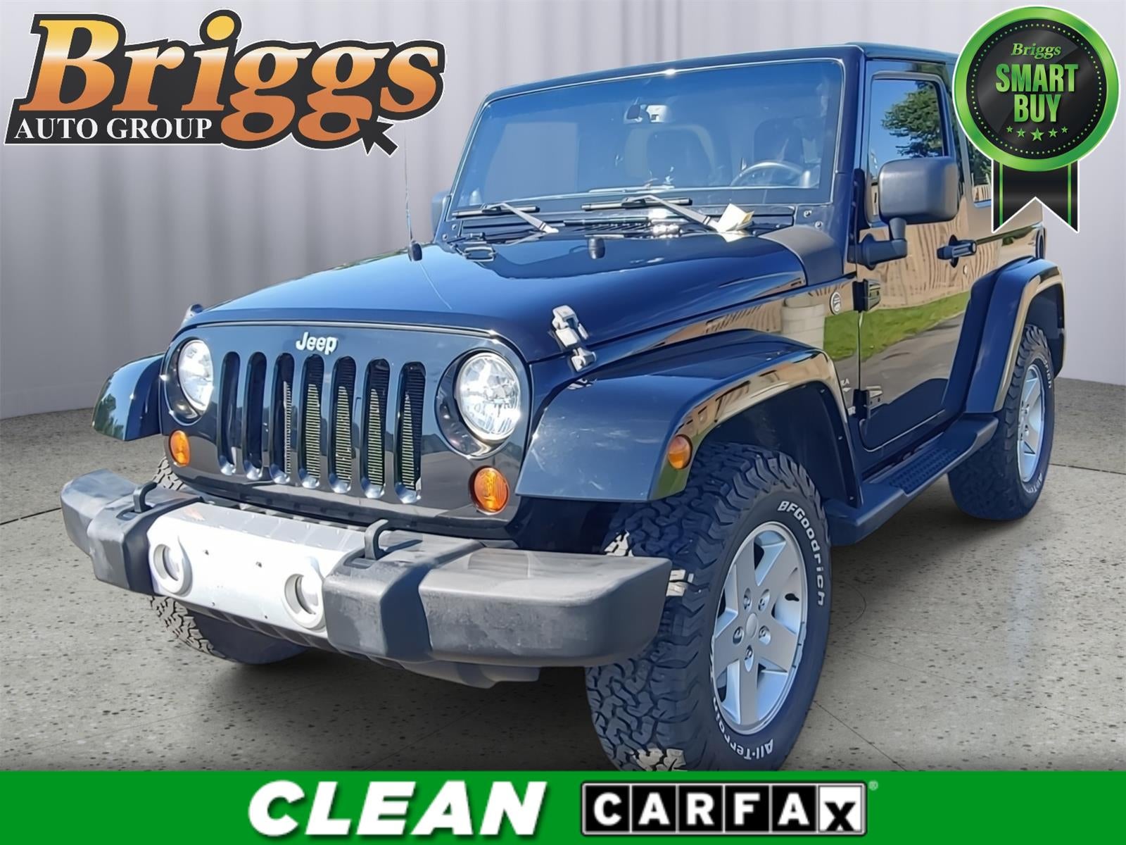 2013 Jeep Wrangler Sahara in Black — front three-quarter view