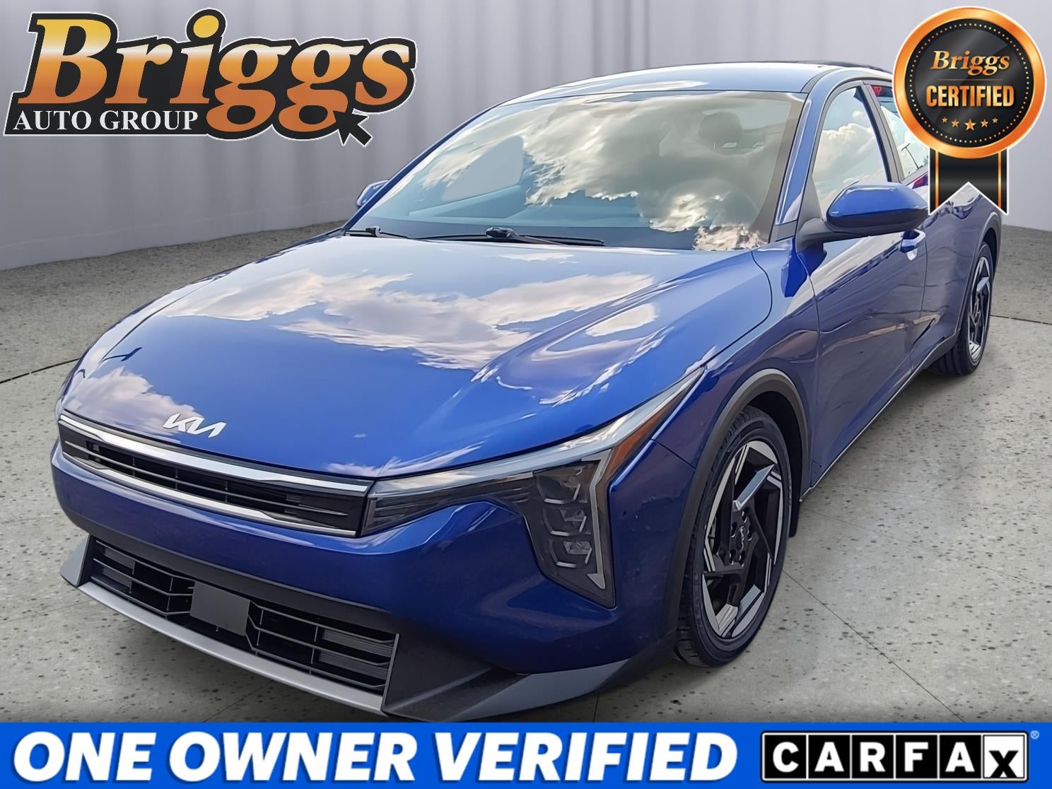 2025 Kia K4 EX in Deep Sea Blue — front three-quarter view
